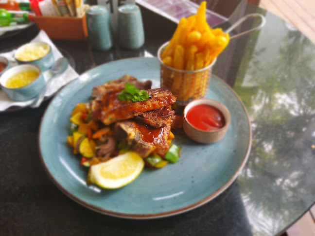 Uhuru Cafe & Wine Emporium - Hospitality and gastronomy