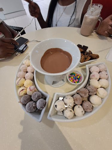 Sandton City Shopping Center, Shop B7, Banking Mall Level Gauteng, Johannesburg, 2000