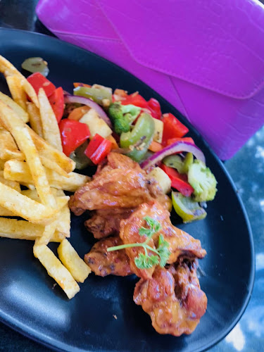 Uhuru Cafe & Wine Emporium - Hospitality and gastronomy