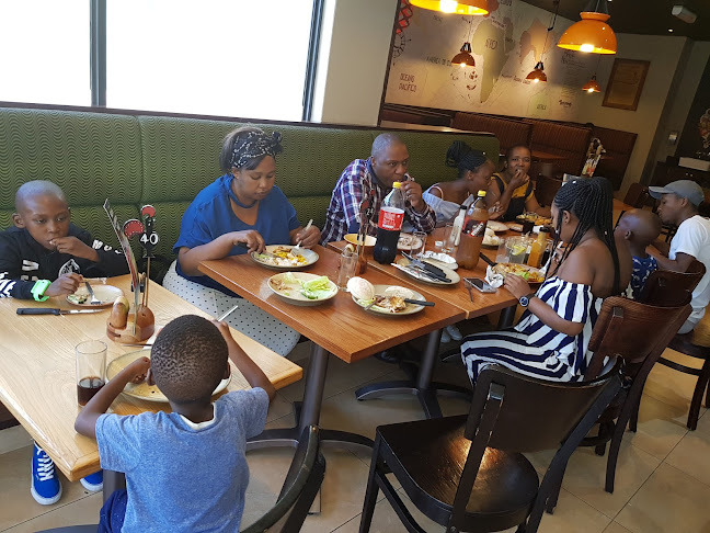 Opinii despre Nando's Oxford Street (East London) în East London - Hospitality and gastronomy